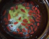A picture of step 2 of Steam Egg White with Goji Berry and Ginko Nuts.