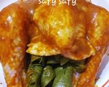 A picture of step 4 of Roast Chicken Stuffed with Grape Leaves.