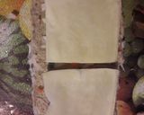 A picture of step 5 of Bread pin wheel sandwich.