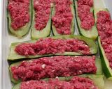 Une image de l'étape 2 de °courgettes farcies à la provençale°.