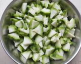 A picture of step 1 of Ridge Gourd Subzi (Turai).
