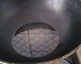 A picture of step 1 of Chicken biryani with potatoes.