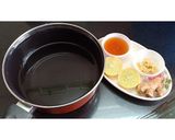 A picture of step 1 of Ginger Lemon Tea.