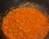 A picture of step 4 of Pasta w butternut squash sauce, sausage and spinach.