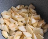 A picture of step 3 of Stove top apple crisp 🍎.