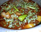 A picture of step 12 of Aloo Gosht.
