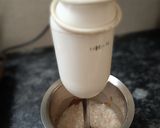 A picture of step 2 of Hershey's chocolate and cocoa thick shake.