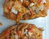 Foto del paso 4 de la receta Berenjenas rellenas con pisto y pollo, gratinadas