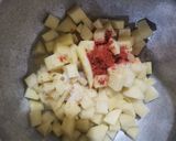 A picture of step 3 of Tomato gravy.