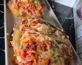 A picture of step 6 of Stuffed Zucchini Gratin in a Dutch Oven.