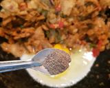 A picture of step 8 of Egg kothu chapati.
