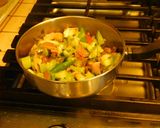 A picture of step 3 of Chili idli fry with leftover idlies.