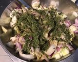 A picture of step 7 of Endive Salad with Cucumber and Red Onion in Chive Dressing.