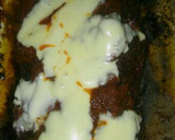 Foto del paso 11 de la receta: Pan de carne relleno con salsa y queso arriba