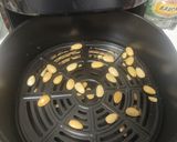 Foto del paso 4 de la receta: Pollo con almendras, airfryer 🍗🥕🥔
