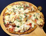 A picture of step 10 of Cheese Burst Veggies And Chicken Pizza From Scratch.
