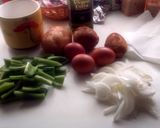 Foto del paso 1 de la receta: Patatas revueltas con huevos, cebolla y pimientos