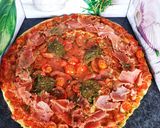 Une image de l'étape 5 de Tarte fine aux tomates 🍅 pesto jambon cru.