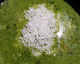A picture of step 5 of Thai green rice with fried fish.