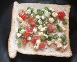 A picture of step 4 of Egg Chilli Cheese Toast.