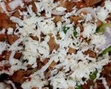 A picture of step 7 of Pizza chicken Tikka  Pizza .