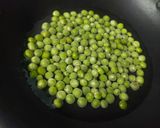 A picture of step 1 of Red Carrot, Peas and Potato Sabzi.