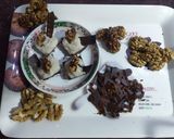 A picture of step 9 of Walnut phirni in chocolate square.