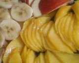 Foto del paso 2 de la receta: Invertida frutal 🍑🍎🍌-torta de naranja 🍊