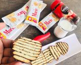 A picture of step 8 of Instant Marie biscuit Cake.