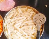 A picture of step 1 of Cheesey Creamy White sauce pasta.