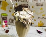 A picture of step 4 of Leftovers brownie/ chocolate cake shake.