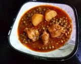 A picture of step 16 of Karahi style alu matr chicken ka salen.