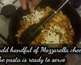 A picture of step 8 of Sausage corn macaroni pasta.