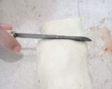 A picture of step 8 of Pizza Pinwheels.