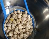 A picture of step 1 of Chole ragda with potato pattice.