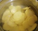 Foto del passaggio 3 della ricetta Tortino gratinato di alici e patate al forno