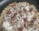 A picture of step 4 of Maggi pizza.