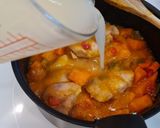 Foto del paso 7 de la receta Jamoncitos de pollo guisados con boniato y tomate