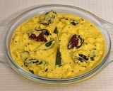 A picture of step 10 of Pazham Kalan-Kerala Ripe Banana Curry (with Phulka) -Sadya Special.