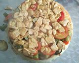 A picture of step 3 of Maklouebah (upsidedown veggie/rice/chicken pot).