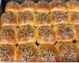 A picture of step 17 of Coconut Sesame Seeds Dinner Rolls.