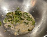 A picture of step 2 of Kairichi saar / maharashtraian raw mango curry.