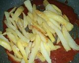 A picture of step 10 of Garlic ketchup fries.
