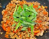 A picture of step 4 of Gapao rice.