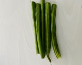 A picture of step 1 of Sharagwani Shing Nu Shaak (Moringa curry).
