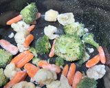 A picture of step 1 of Fish with Green Beans and Rice.