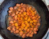 A picture of step 1 of Spicy Fava Beans with burger bun.