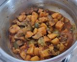 A picture of step 3 of Brinjal potato mint masala.