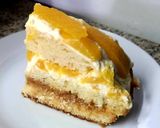 Foto del paso 4 de la receta: Torta bizcocho de vainilla con duraznos, crema y dulce de leche