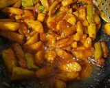 A picture of step 10 of Bihari Style Dry Parwal Aloo Masala.